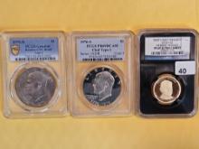 Three mixed PCGS and NGC-graded Modern Dollars