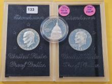 Three GEM Proof US Silver Dollars