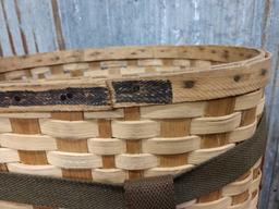 Two wicker trapping baskets