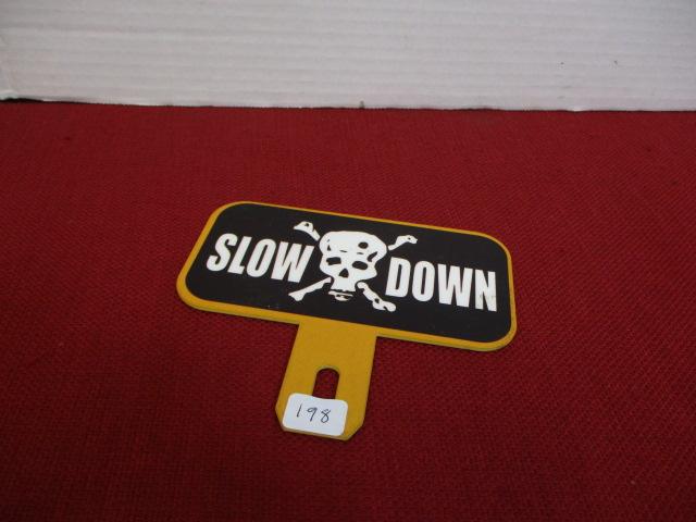 Porcelain License Plate Topper-Slow Down w/ Skull & Cross Bones
