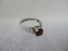 Sterling Silver with Round Raised Jewel (Ruby?) Ring