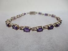 Sterling Silver 7" Bracelet with 15 Amethyst Oval Gems