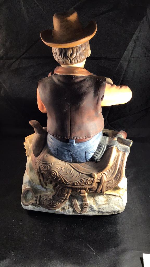 Cowboy fiddler musical figurine.   Animated.
