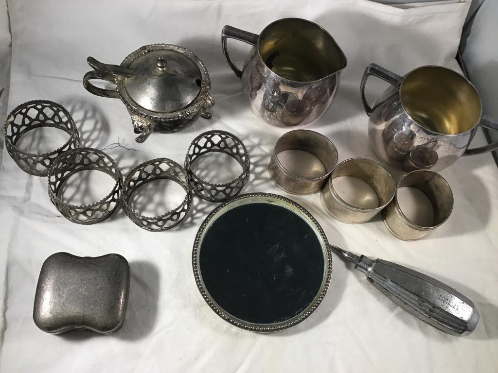 Silverplate napkin rings, fancy vanity mirror,