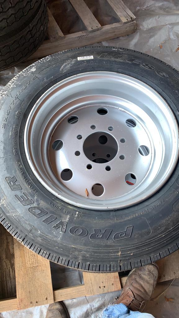1 of 2 New Tire 215/75 R 17.5 w/rim