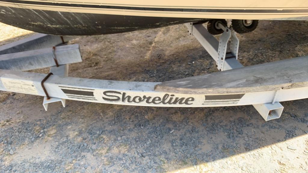 Center console boat with trailer