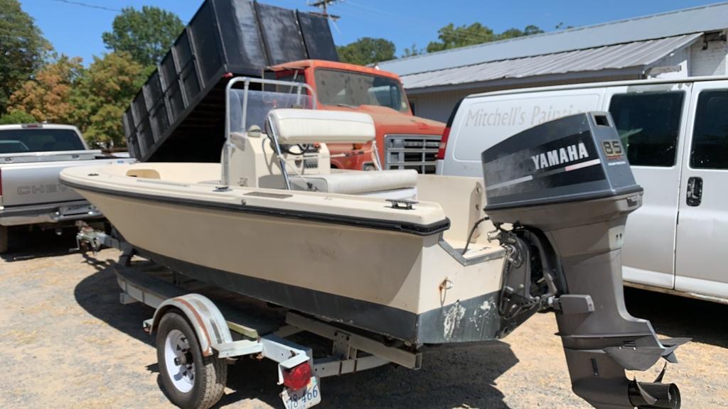 Center console boat with trailer
