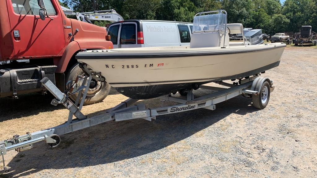 Center console boat with trailer