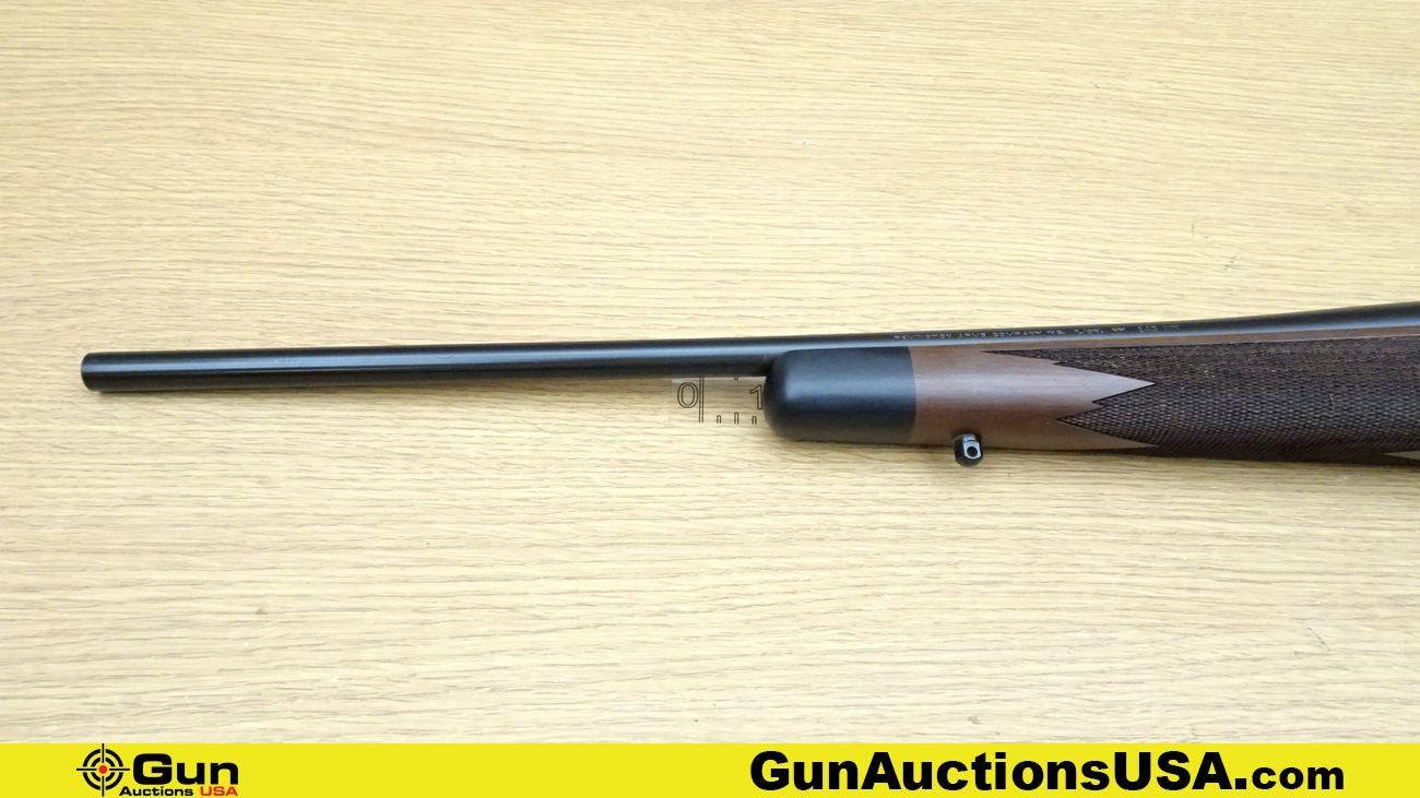 Remington SEVEN 243 WIN UNFIRED/JEWELED BOLT Rifle. Excellent. 19.75" Barrel. Bolt Action Features a