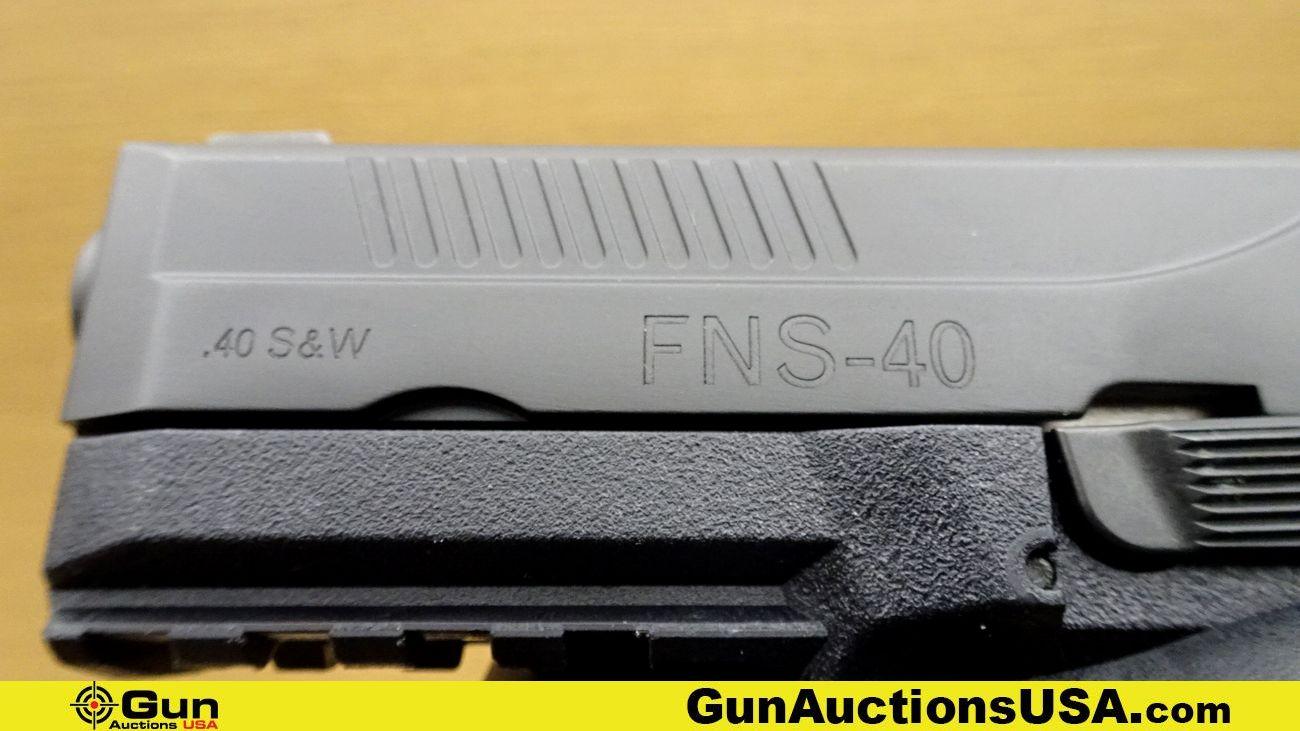 FNH USA FNS-40 .40 S&W Pistol. Excellent. 4" Barrel. Shiny Bore, Tight Action Semi Auto The FNS-40 i