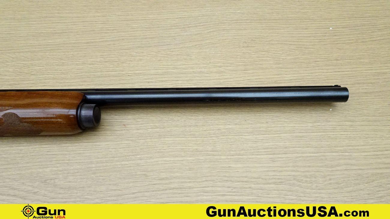 REMINGTON 1100 12 ga. Shotgun. Very Good. 25.5" Barrel. Shiny Bore, Tight Action Semi Auto Features