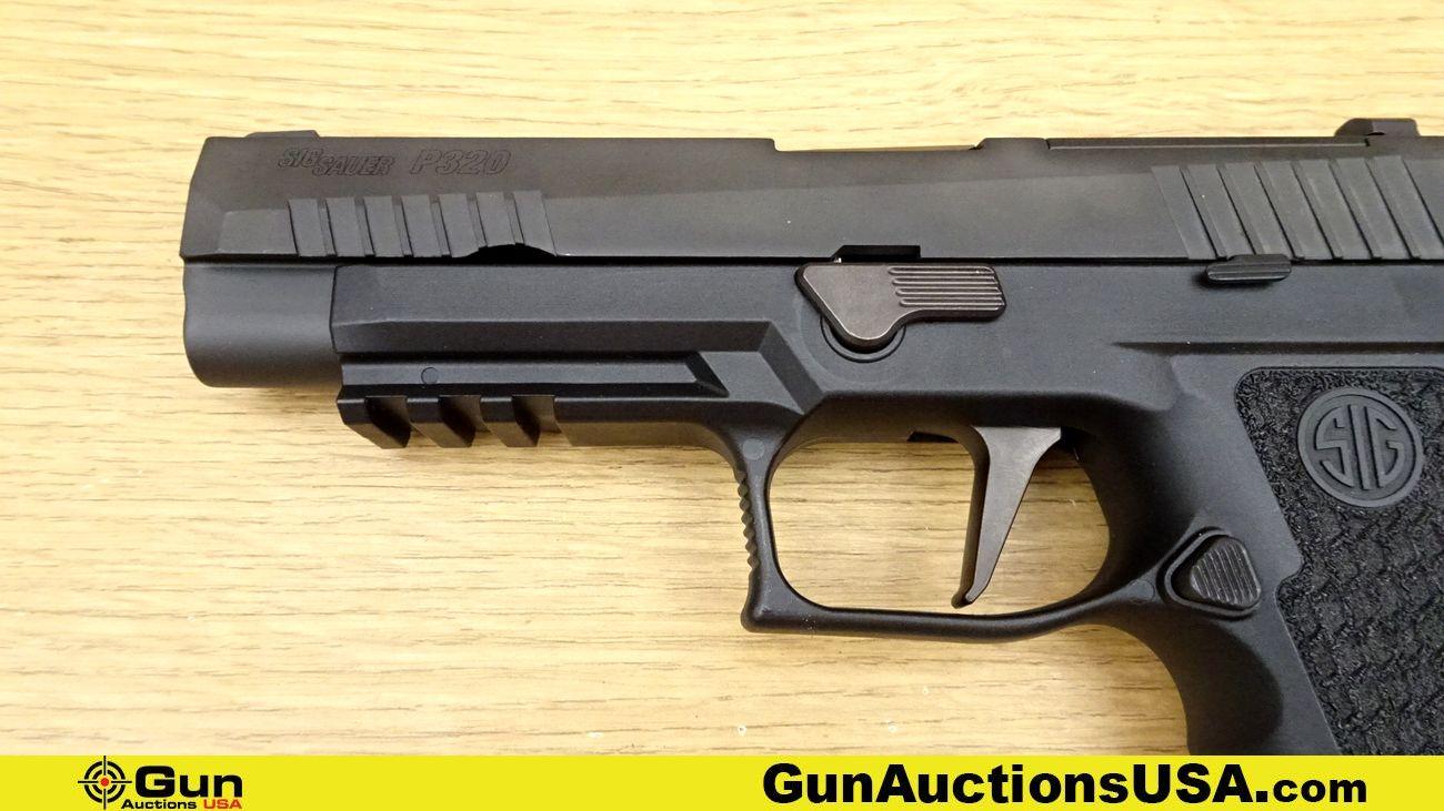 SIG Sauer P320 9mm Pistol. Excellent. 4.5" Barrel. Shiny Bore, Tight Action Semi Auto The P320 9mm p