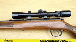 Marlin 883 .22 WMR Rifle. Very Good. 22" Barrel. Shiny Bore, Tight Action Bolt Action Features a Wal