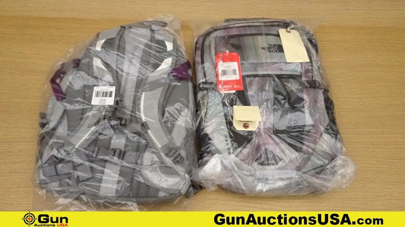 The North Face Recon Backpacks. Excellent. Lot of 2; 1-Grey/Purple, 1- Low Key Tie Dye.. (54461)