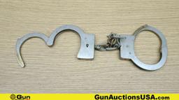 Argus, Etc. ANTIQUE Handcuffs, Etc. . Good Condition. Lot of 6; 1-Black Jack Leather SAP Stick. 2- C