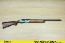 REMINGTON 1100 12 ga. Shotgun. Good condition, Normal Handling Marks, Scattered Spotting and/or Pitt