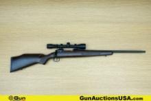 Savage 10 .223 RIFLE. Good condition, Normal Handling Marks, Scattered Spotting and/or Pitting. 22"