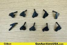 1911 Gun Parts. Good Condition. Ten Assorted 1911 Thumb Safeties.. (76664) (GSCM16)