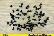 1911 Gun Parts. Good Condition. Approx. Eighty Assorted Grip Screws.. (76674) (GSCM97)