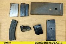 Winchester, Etc. Mags, Etc. . Good Condition. Three large Steel Unknown Magazines. One Winchester 18