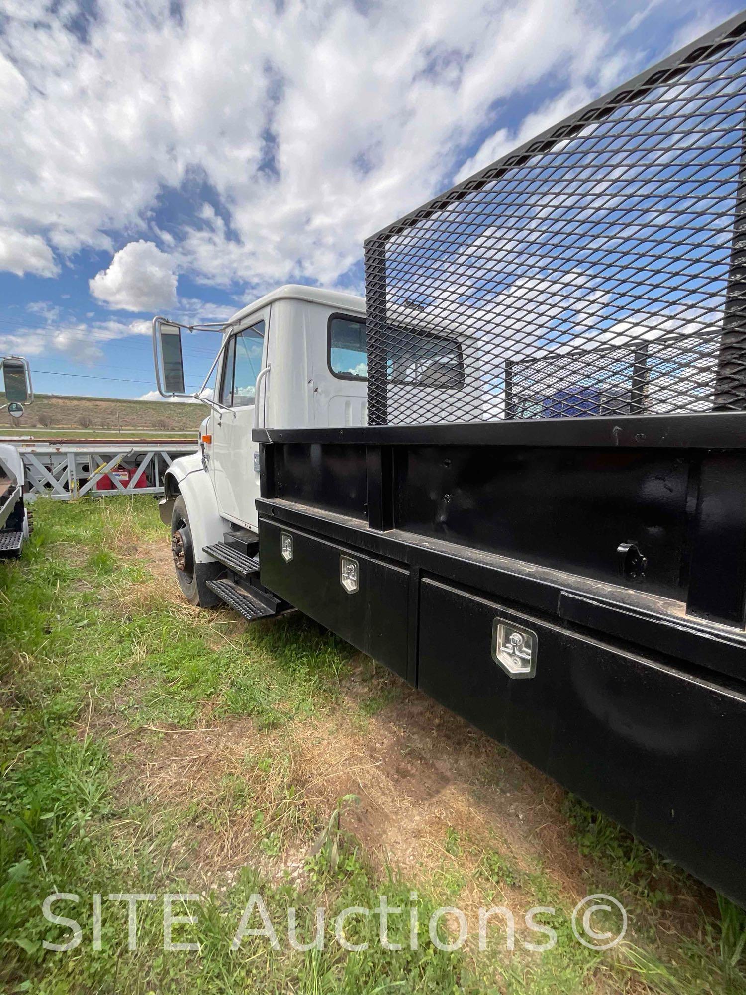 1998 InternationaL 4900 S/A Flatbed Truck w/ Ramps