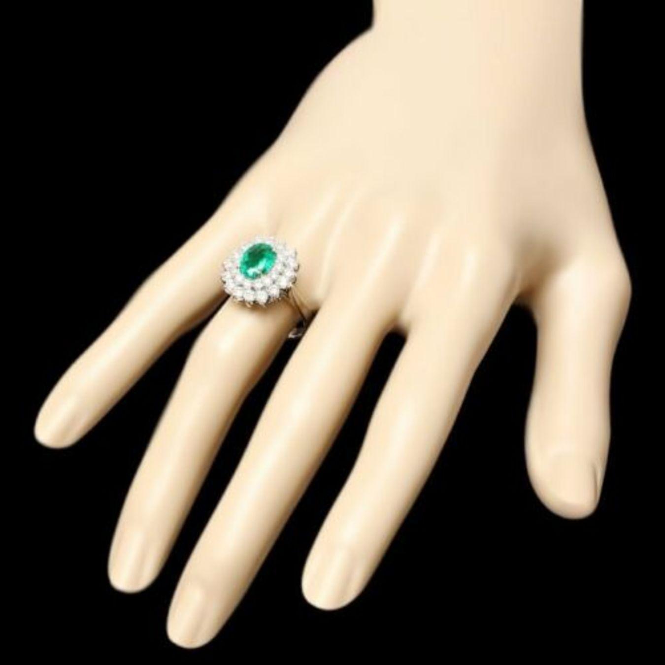 14K White Gold 1.47ct Emerald and 1.32ct Diamond Ring