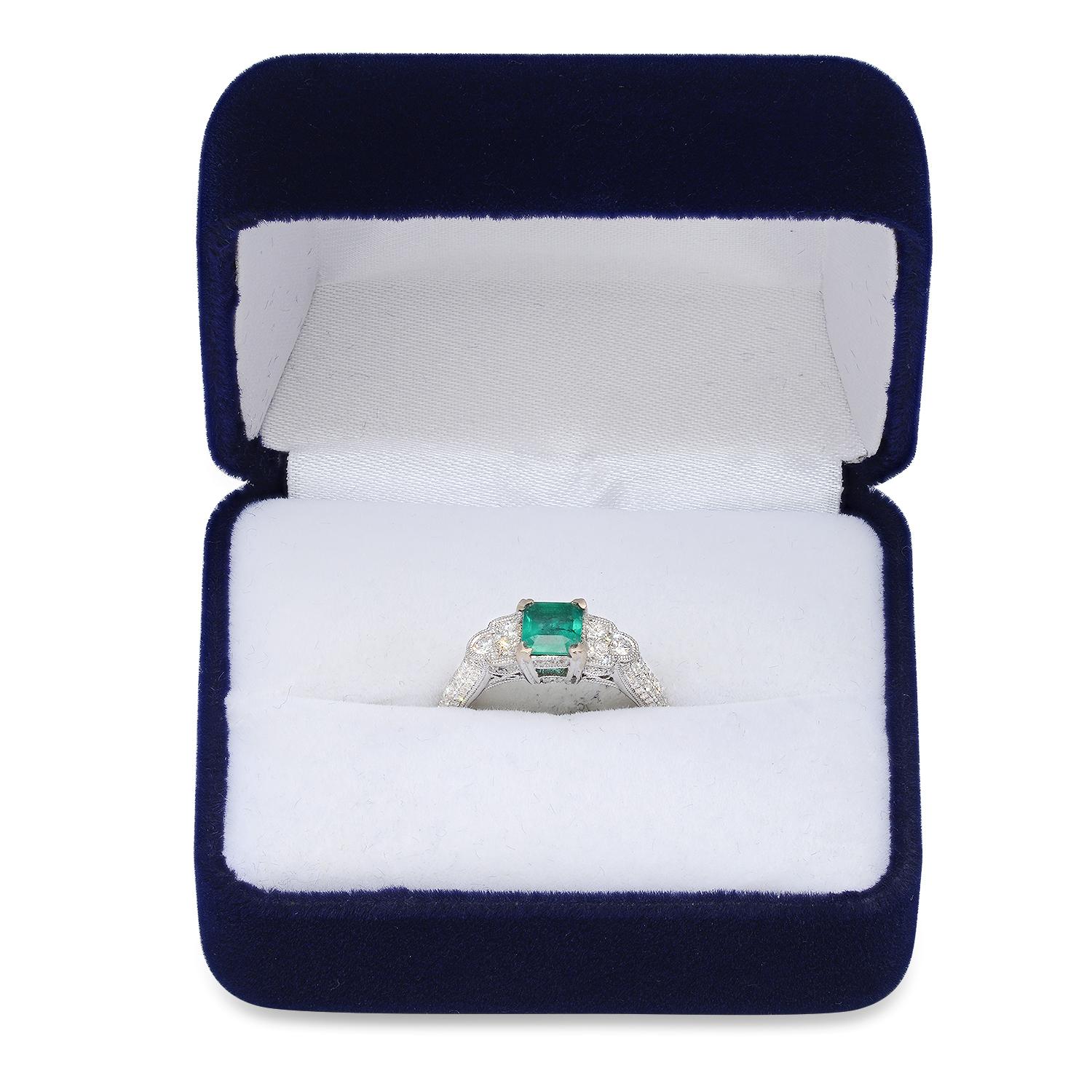 18K White Gold Setting with 0.68ct Emerald and 1.14ct Diamond Ring