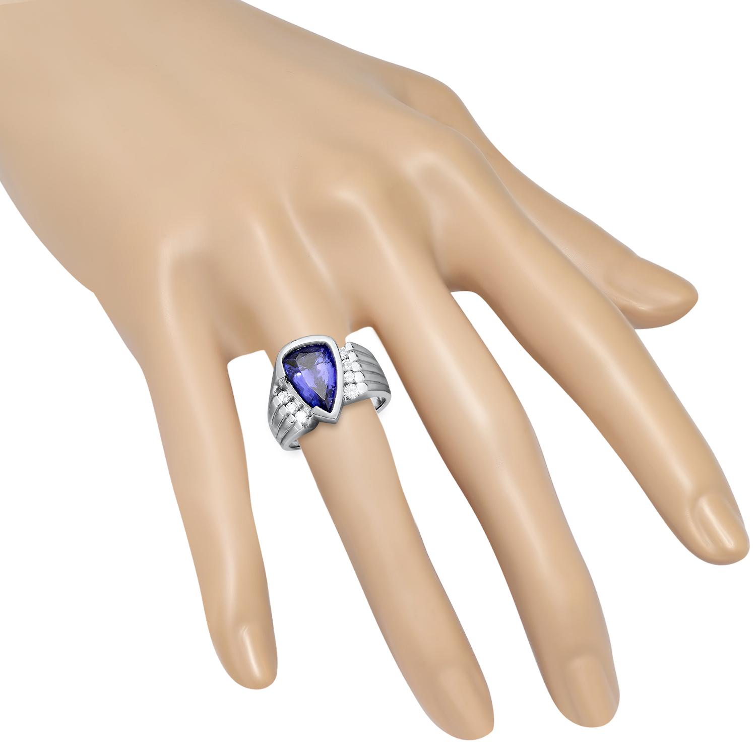 14K White Gold Setting with 3.94ct Tanzanite and 0.23ct Diamond Ladies Ring