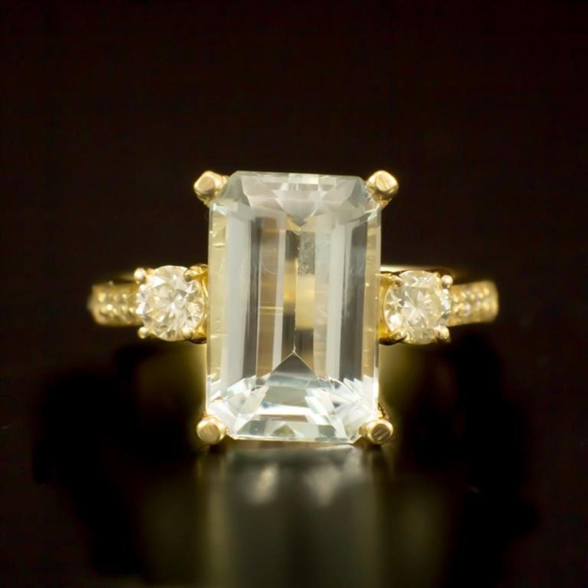 14K Gold 4.33ct Aquamarine and 0.50ct Diamond Ring