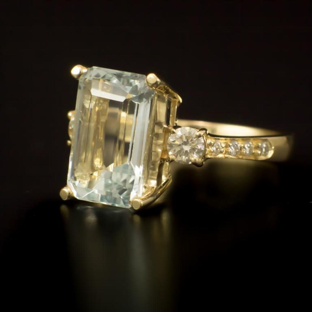 14K Gold 4.33ct Aquamarine and 0.50ct Diamond Ring