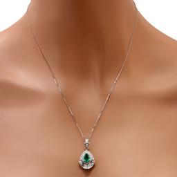 Platinum and 10K White Gold Setting with 1.41ct Emerald and 0.86ct Diamond Pendant