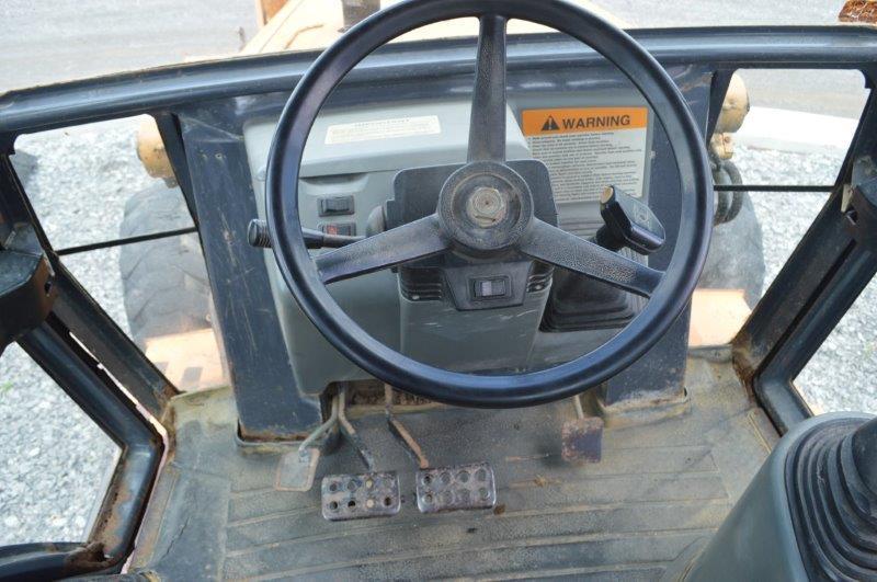 Case Super L backhoe w/ 7.5' front bucket, 21" digging bucket, ext.hoe, 6,619 hrs, 4wd,21L-24 rear t