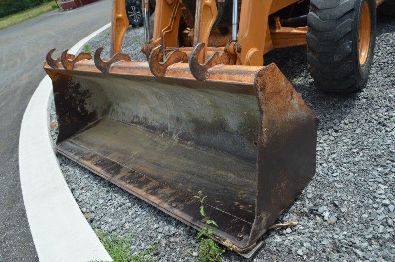 Case Super L backhoe w/ 7.5' front bucket, 21" digging bucket, ext.hoe, 6,619 hrs, 4wd,21L-24 rear t