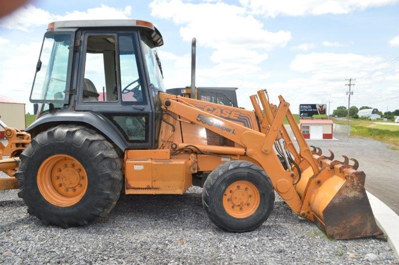 Case Super L backhoe w/ 7.5' front bucket, 21" digging bucket, ext.hoe, 6,619 hrs, 4wd,21L-24 rear t