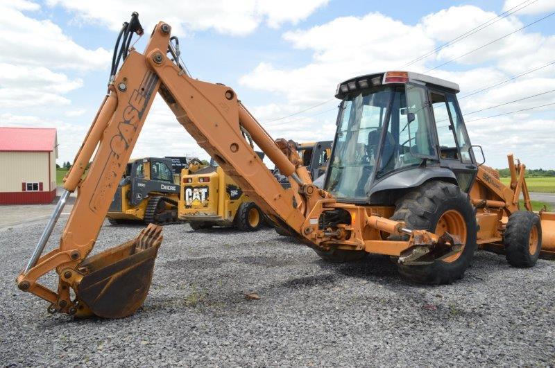 Case Super L backhoe w/ 7.5' front bucket, 21" digging bucket, ext.hoe, 6,619 hrs, 4wd,21L-24 rear t