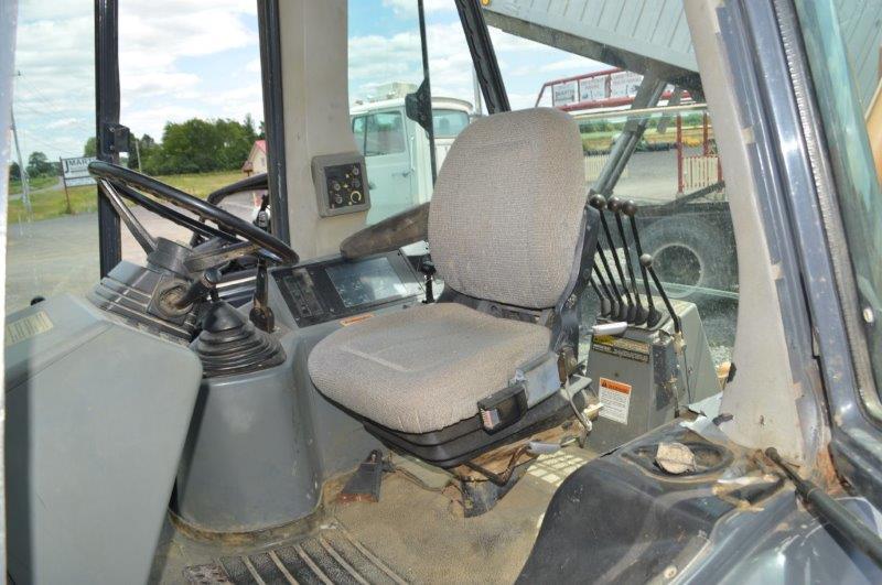 Case Super L backhoe w/ 7.5' front bucket, 21" digging bucket, ext.hoe, 6,619 hrs, 4wd,21L-24 rear t