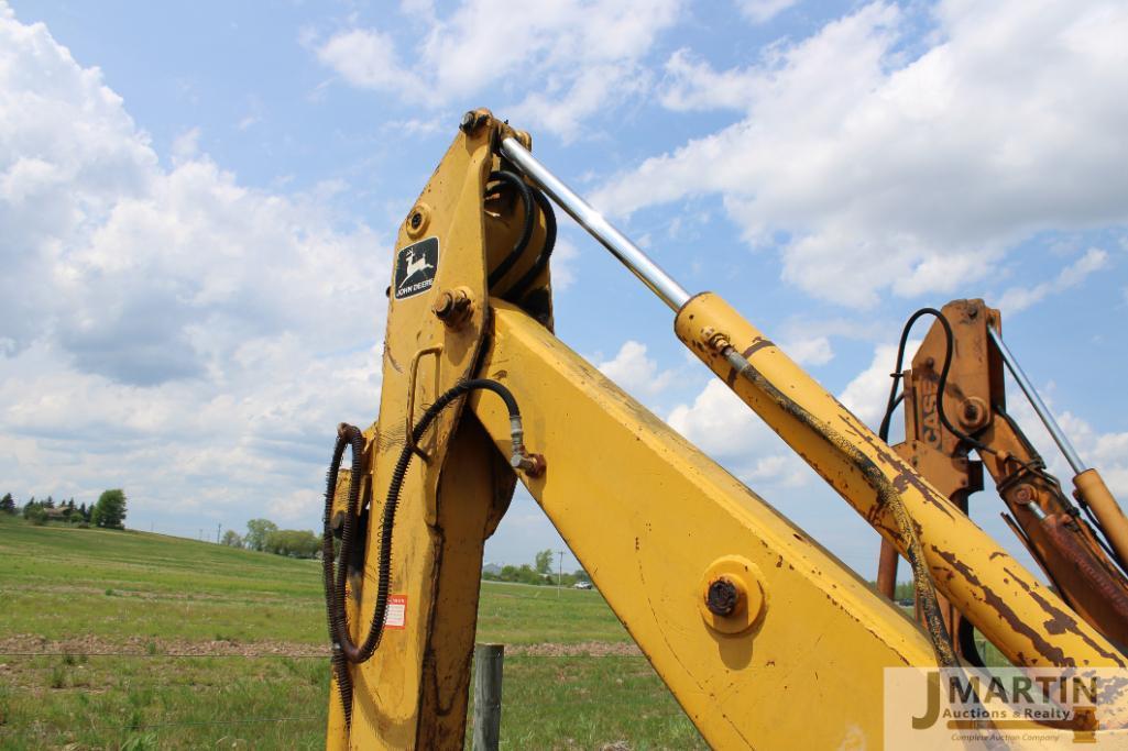 JD 310 backhoe