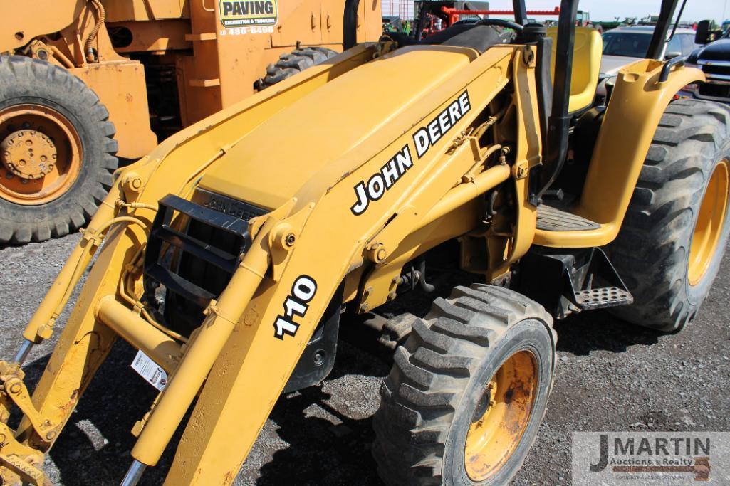 JD 110 loader tractor