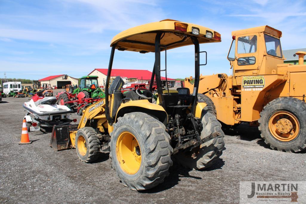 JD 110 loader tractor