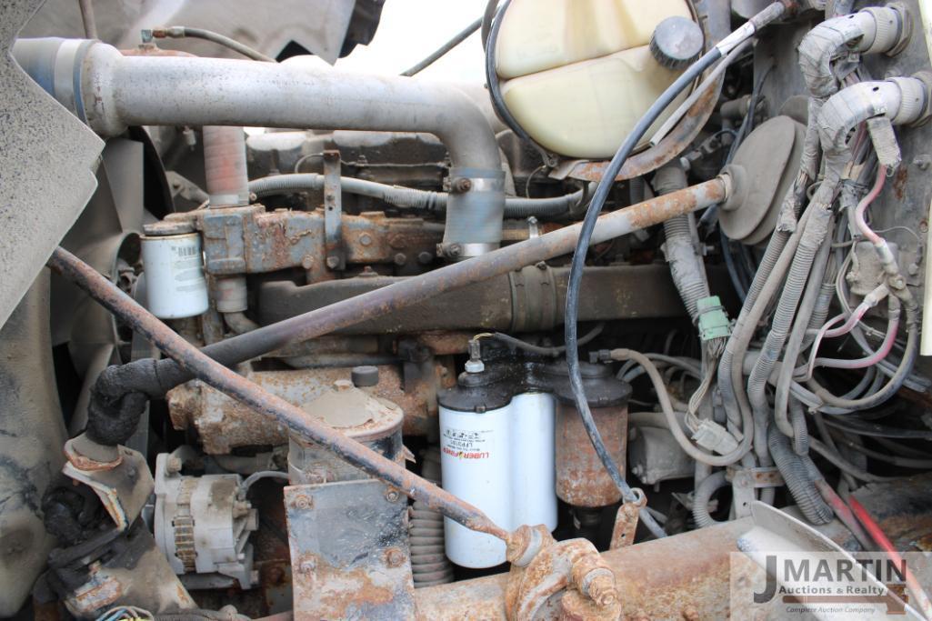 2000 Mack RD6 roll-off truck