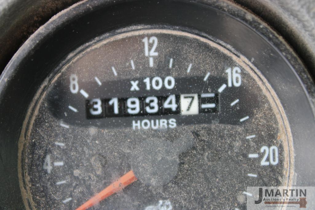 2000 Mack RD6 roll-off truck