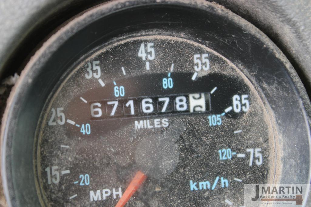 2000 Mack RD6 roll-off truck