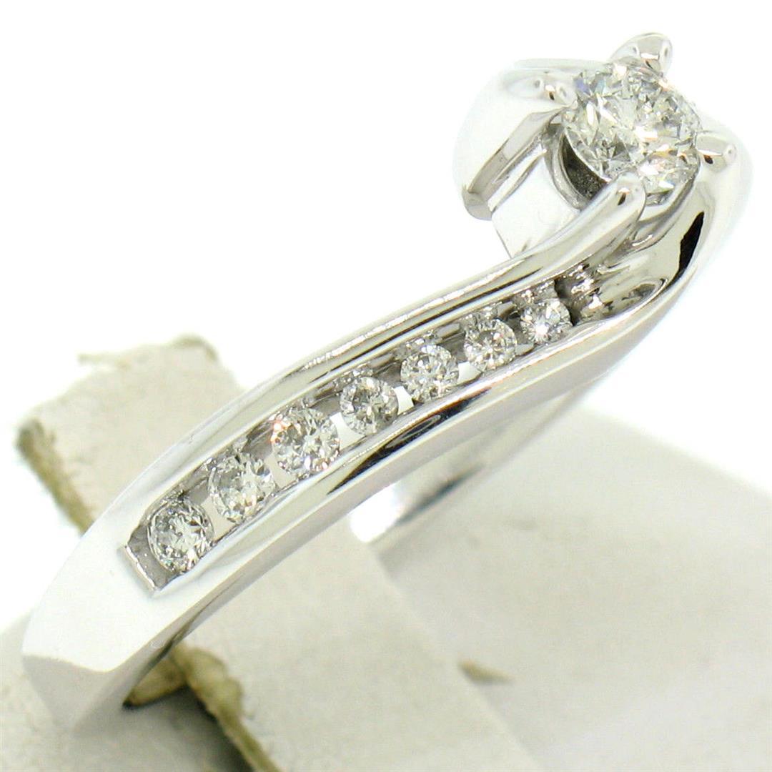 14k White Gold 0.55 ctw Round Diamond Channel & Solitaire Twist Swirl Bypass Rin