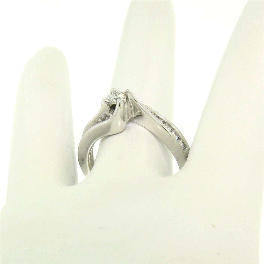 14k White Gold 0.55 ctw Round Diamond Channel & Solitaire Twist Swirl Bypass Rin