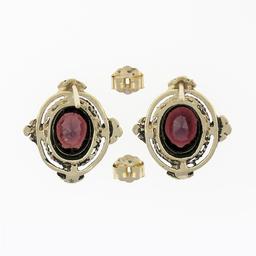 Vintage 14k Yellow Gold 3.20 ctw Oval Garnet Flower Open Work Frame Stud Earring