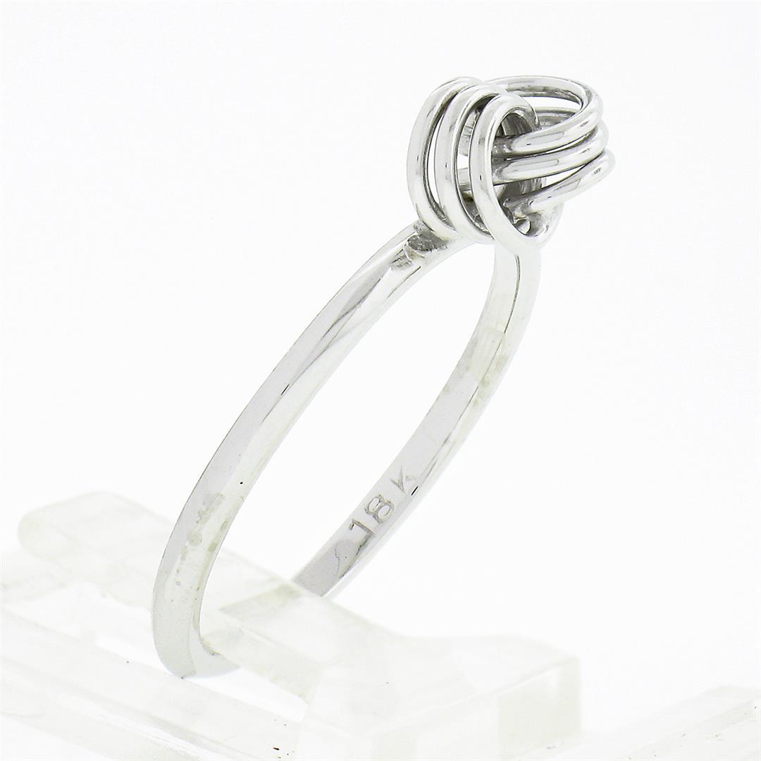 Petite 18K White Gold Simple Polished Interlocking Triple Wire Open Knot Ring