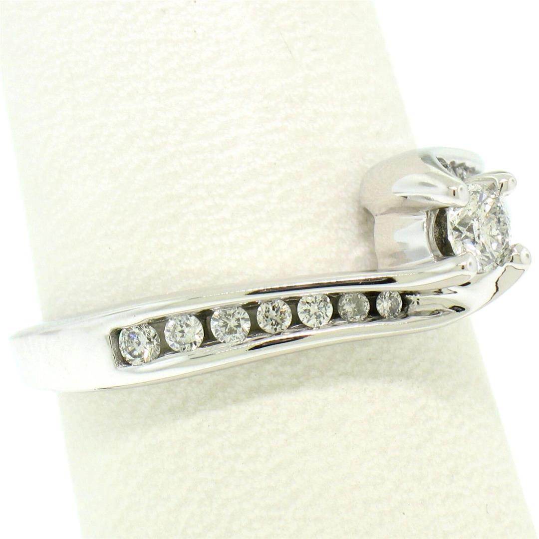 14k White Gold 0.55 ctw Round Diamond Channel & Solitaire Twist Swirl Bypass Rin