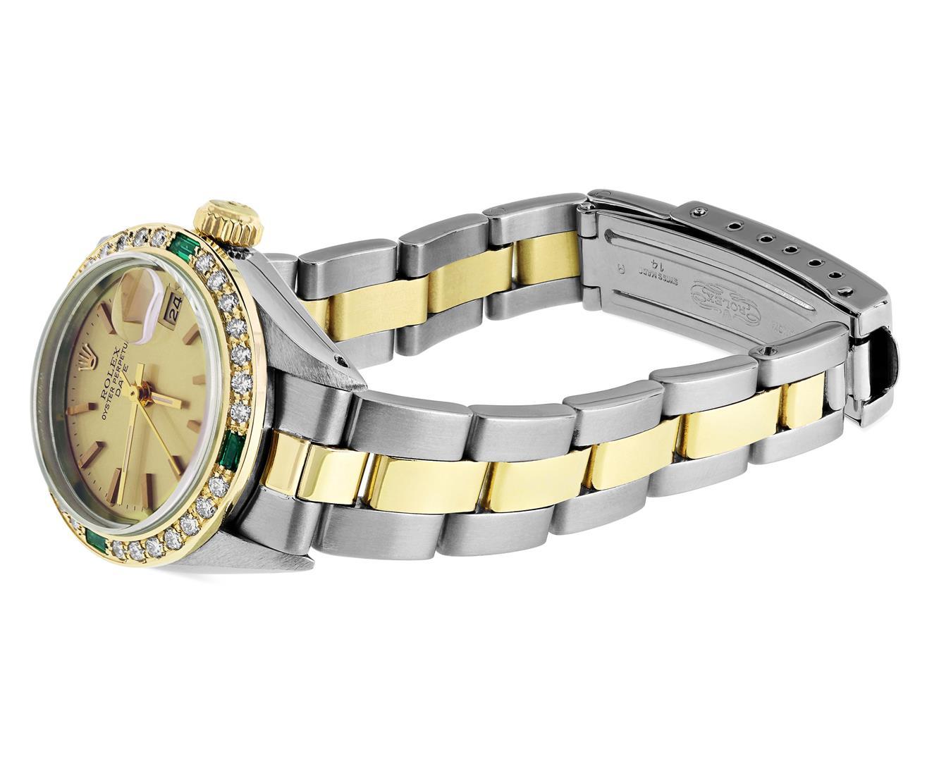 Rolex Ladies 2Tone 18K Yellow Gold Diamond And Emerald Bezel Date Watch With Rol