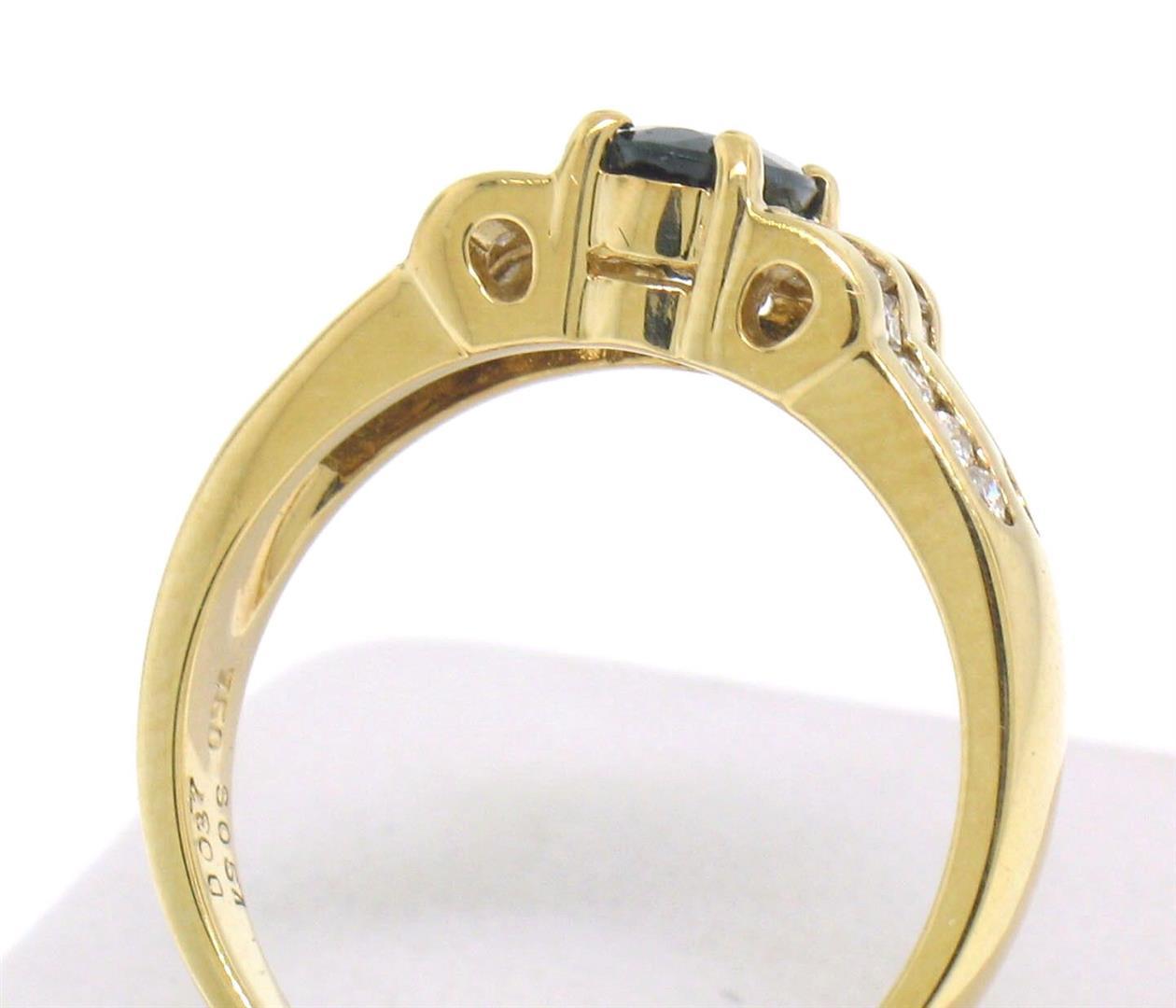 18k Yellow Gold .94 ctw Solitaire Oval Sapphire w/ Baguette & Round Diamond Ring