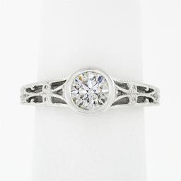 Parade 18k White Gold Bezel Set .87 ctw Diamond Solitaire Milgrain Open Work Rin